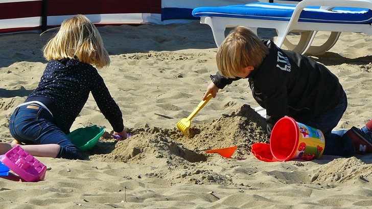 children playing in the sand
